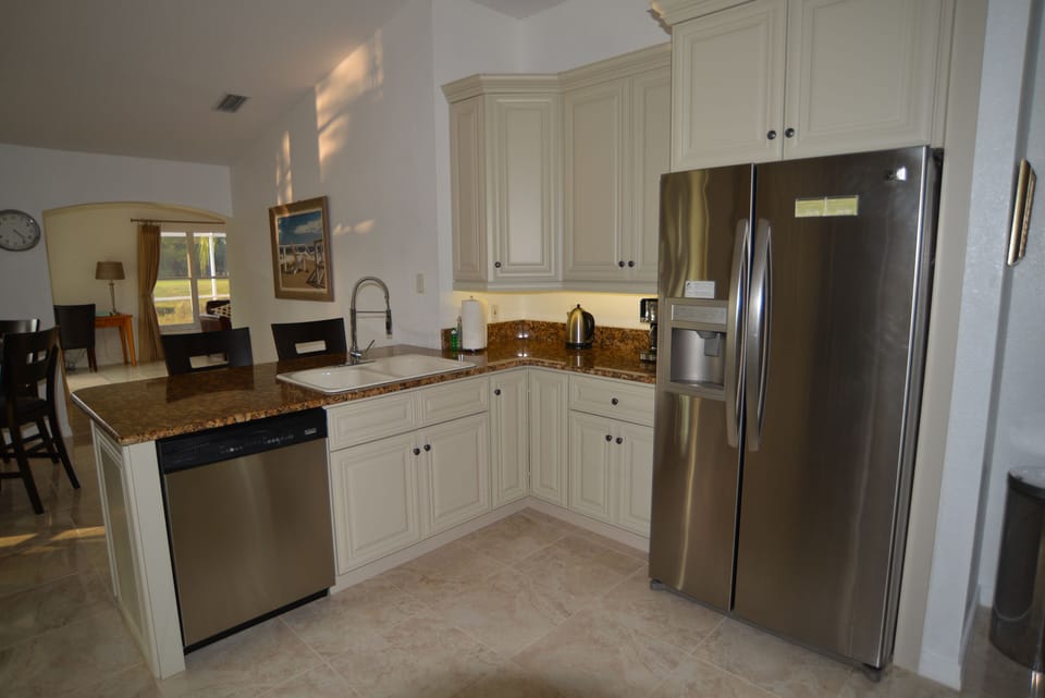 Stainless steel appliances, granite worktops