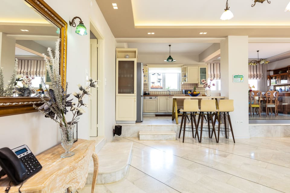 Dining area is next to the kitchen on the ground floor