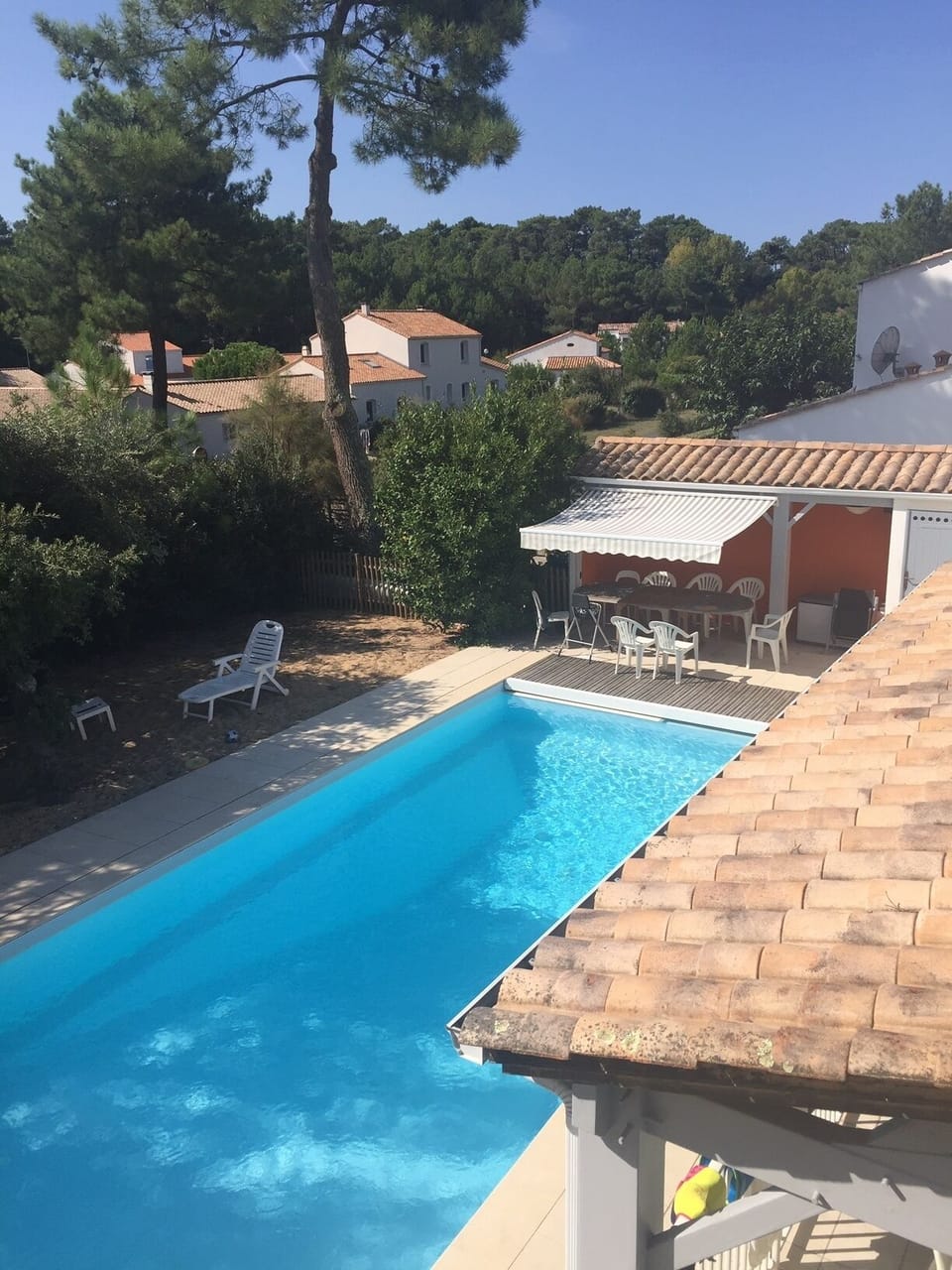 Pool viewed from master bedroom showing breakfast area