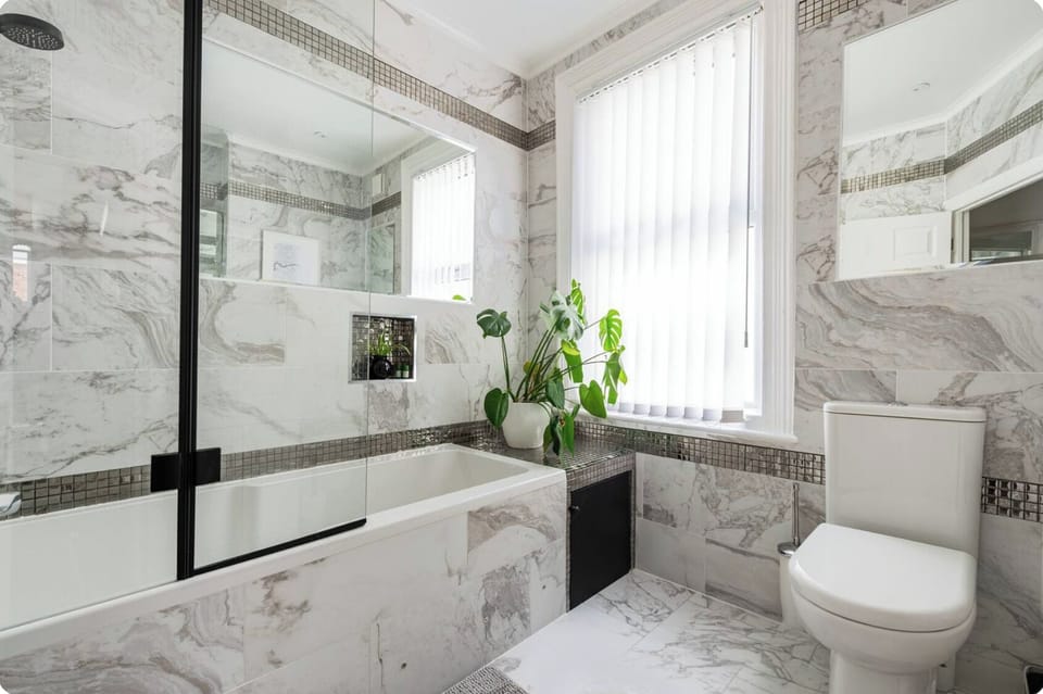 1st floor bathroom, shower, bath tub and toilet