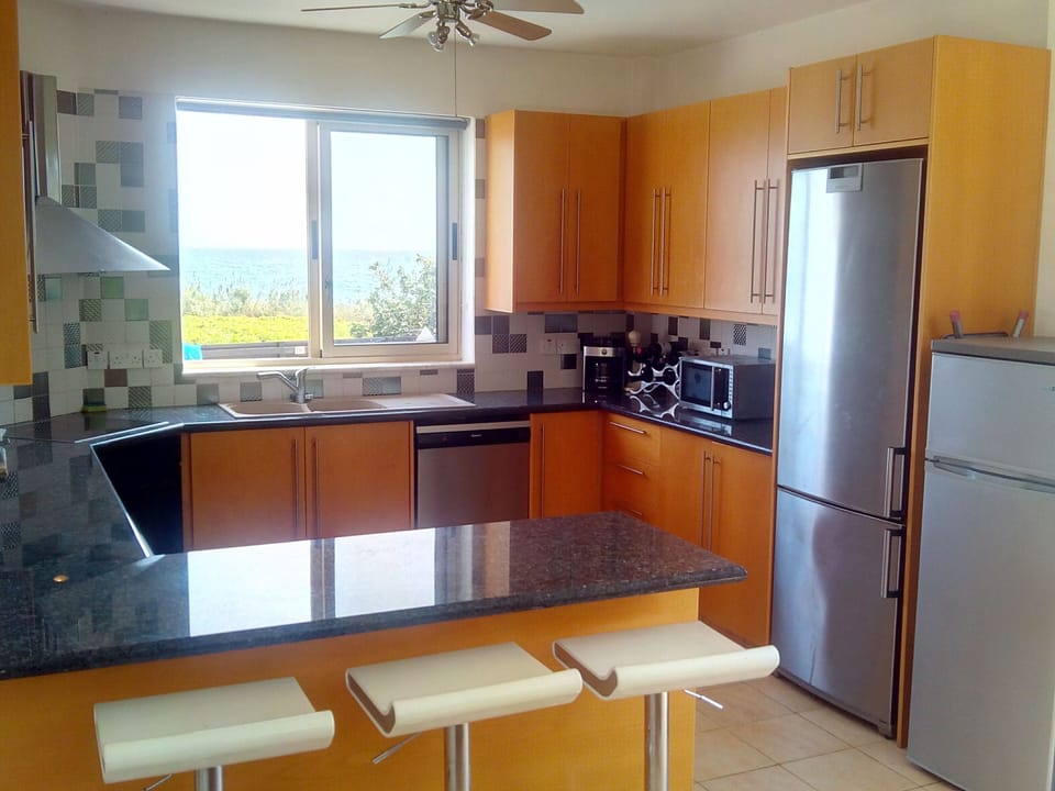 Doing the dishes is not that bad with the sea view!