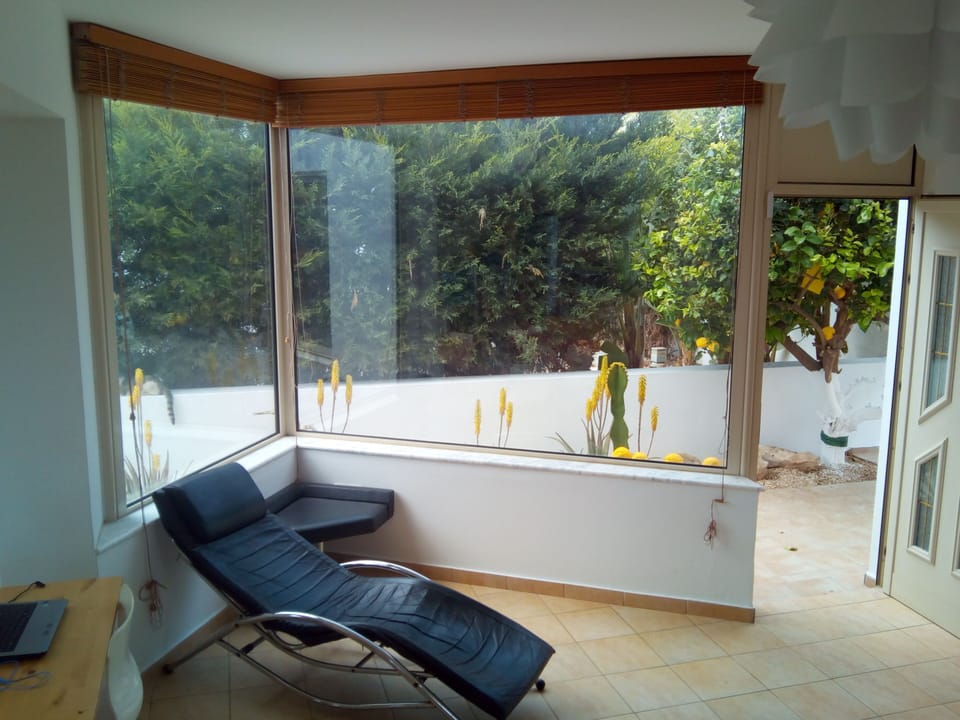 Relax in a quiet spot with views of the lemon tree