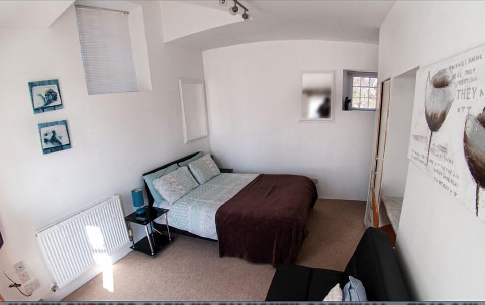 The master bedroom with WiFi and TV