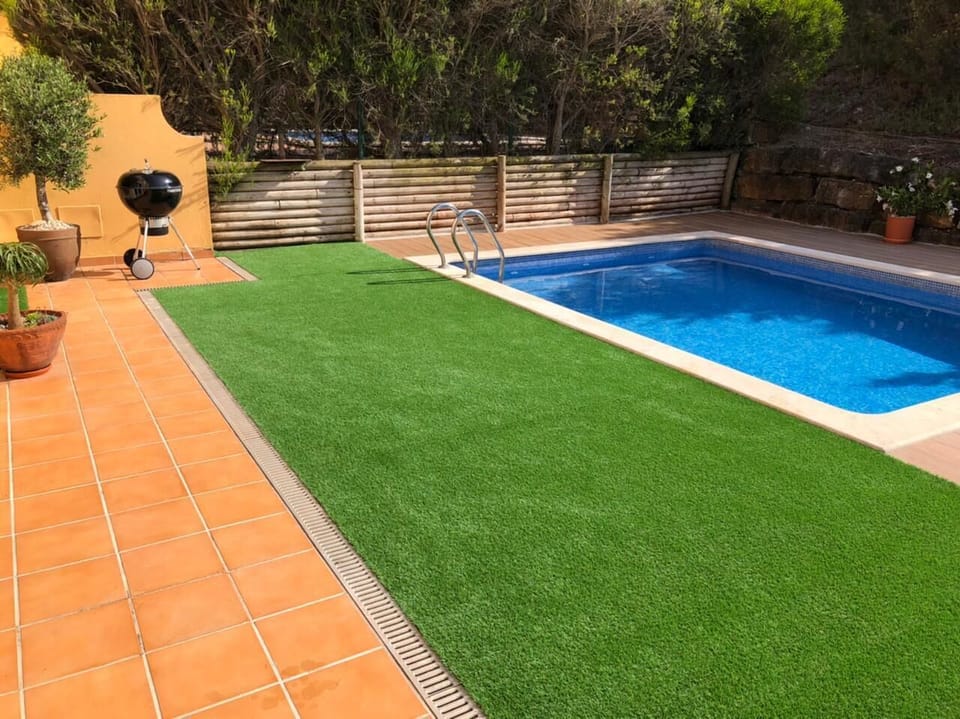 Back garden and pool