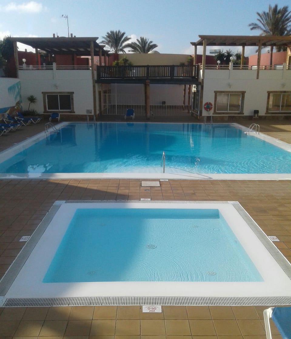 large swimming pool 15m x 15m and kiddy pool