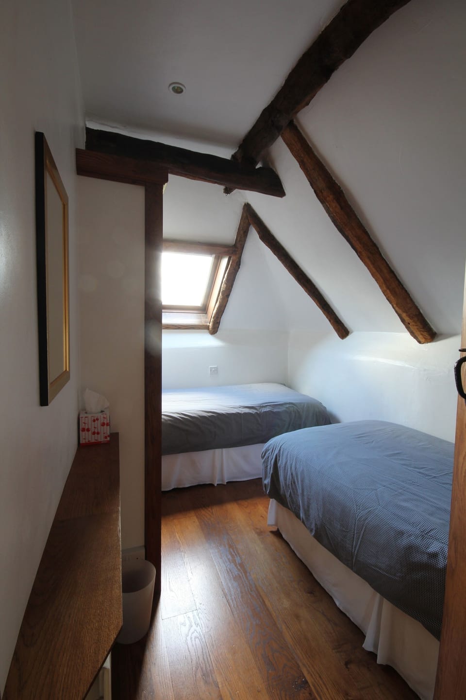 One of the two upstairs twin bedrooms