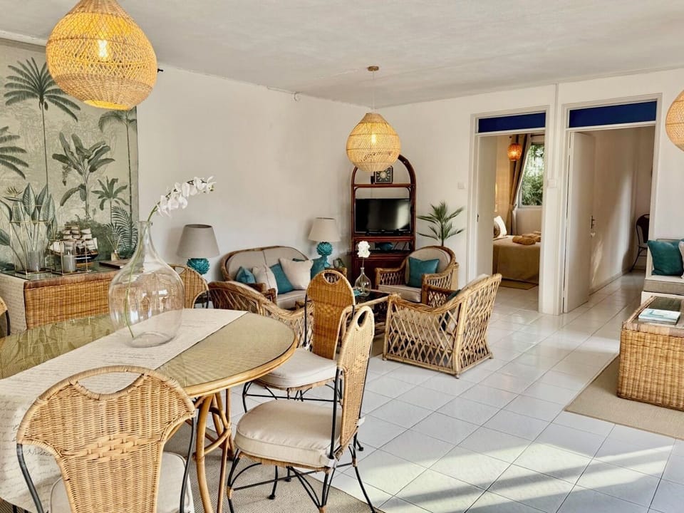 Air-conditioned, spacious & bright  living/dining area, - showing bedroom doors