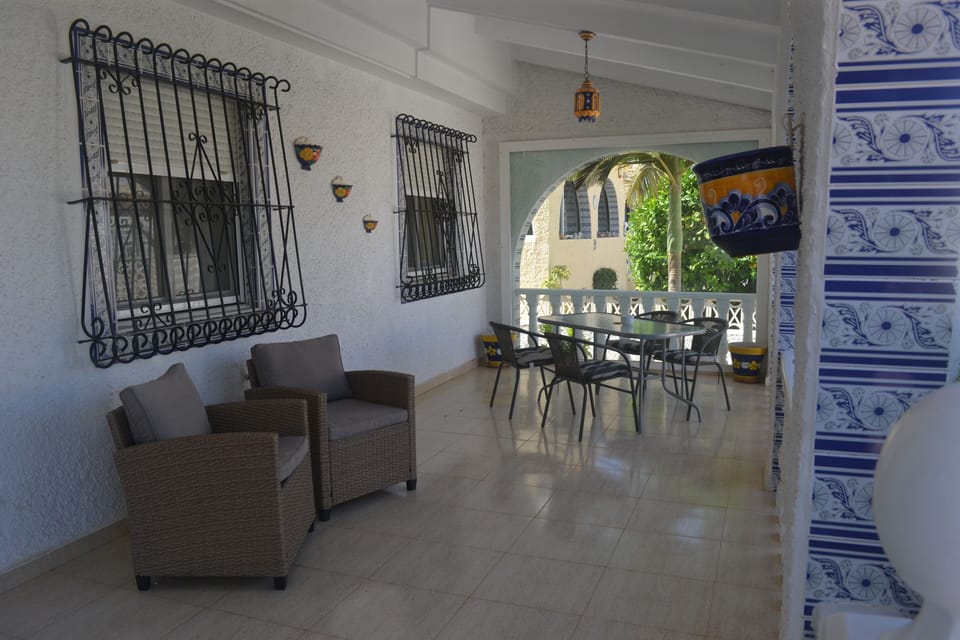 Front terrace with dining area, escape the midday sun 