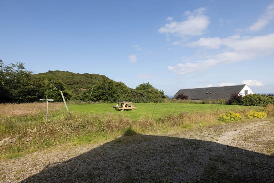 Lawned garden from door of Pines.
