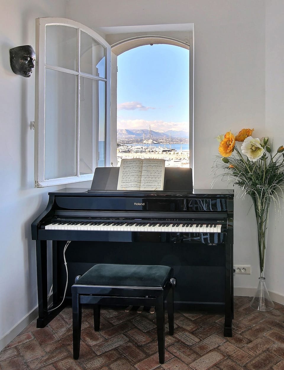 The view of the marina and beach are delightful from the Roland Digital Piano.