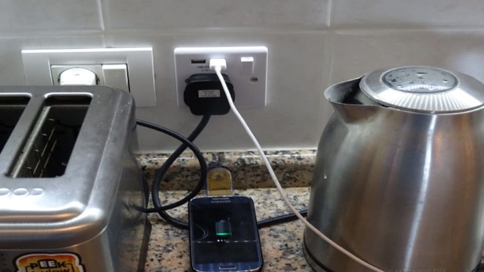 uk plug socket fitted in kitchen with usb charging points