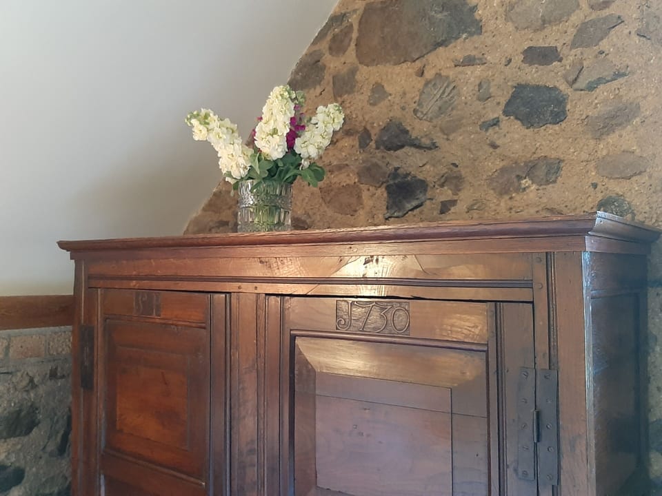 Second upstairs bedroom with  king size cast iron bed