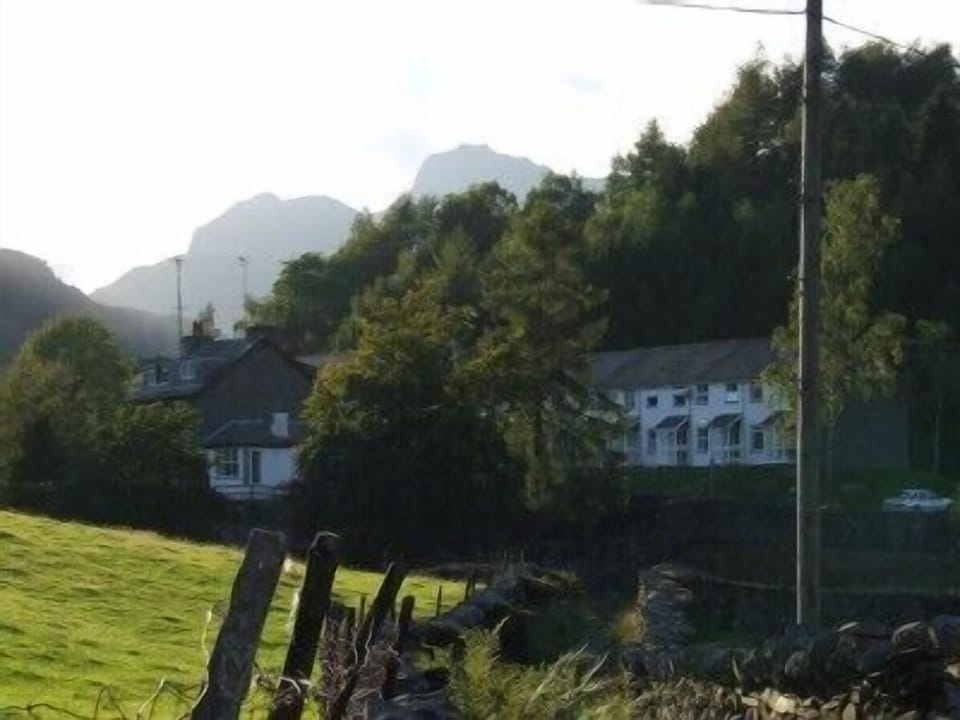Spot the Langdale Pikes peaking just behind the cottage