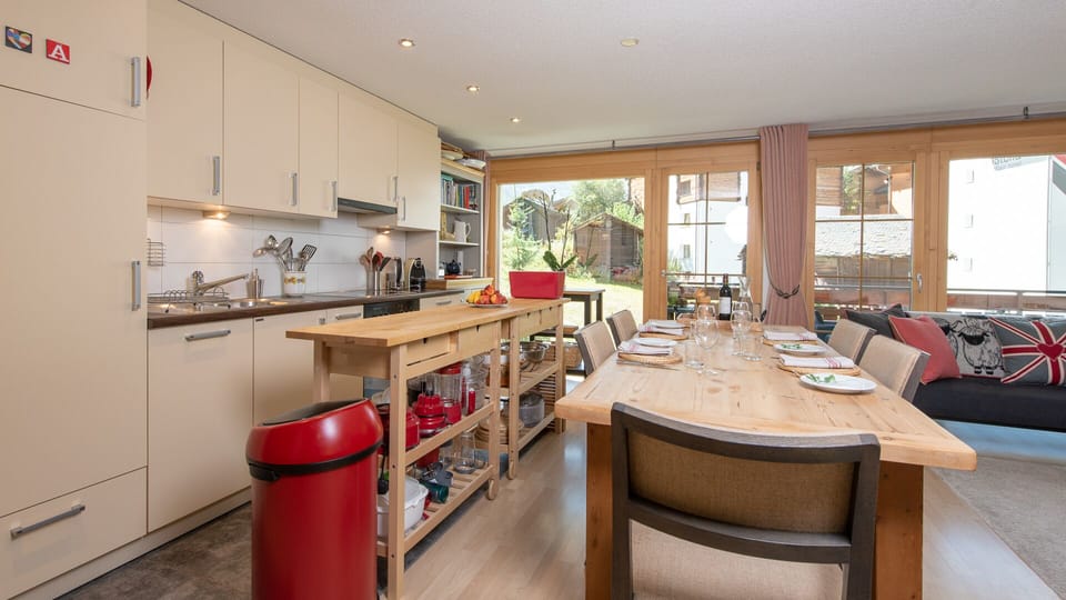 Well equipped kitchen along one side of the open plan living space