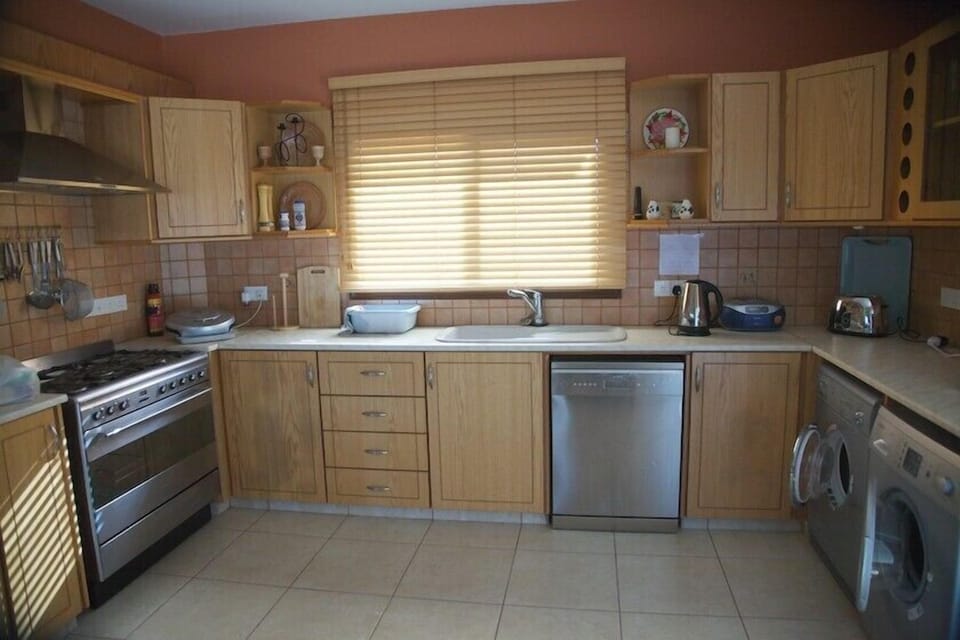 The kitchen with modern appliances