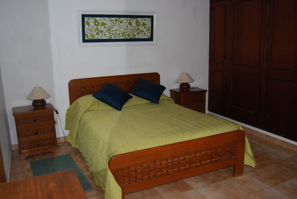 bedroom double bed and an extra divan