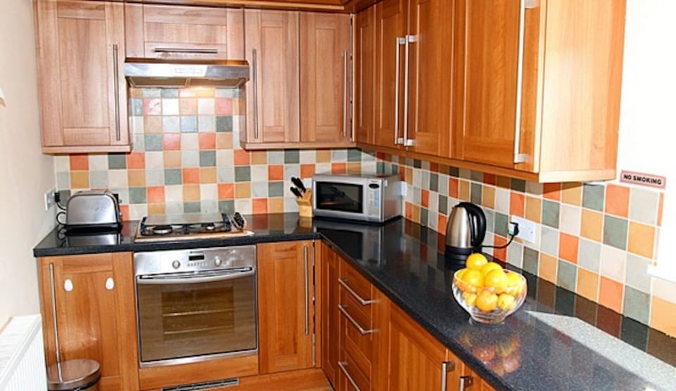 well equipped kitchen with the added bonus of a dryer
