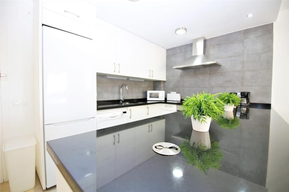 The modern kitchen also has breakfast bar