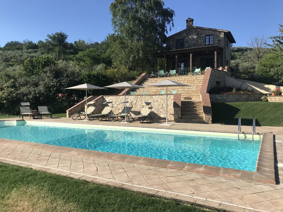 Pool, main terrace and house