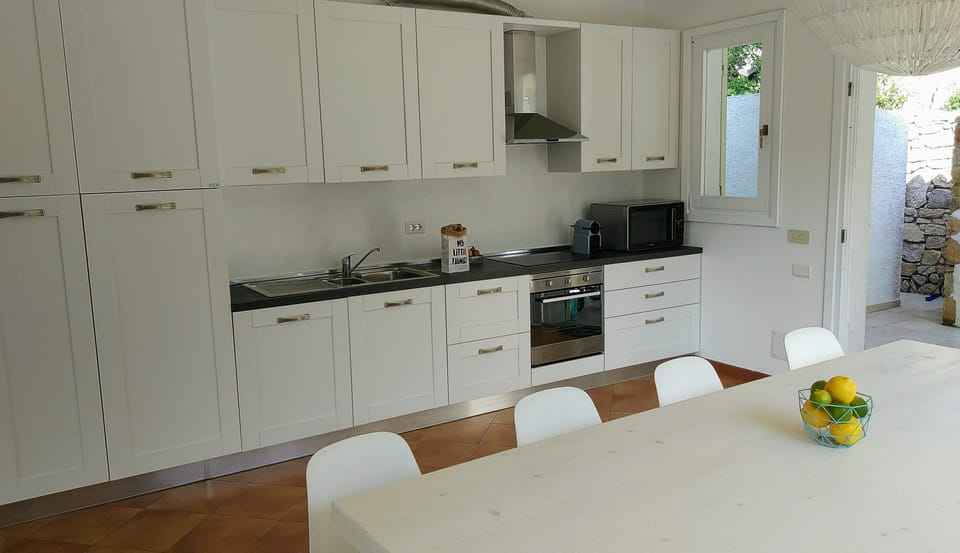 Modern kitchen with everything you need, including microwave