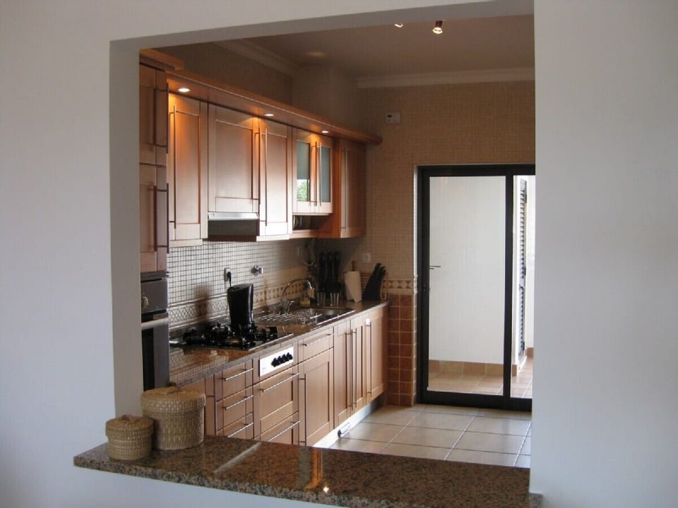 Well equipped modern kitchen, patio door to BBQ
