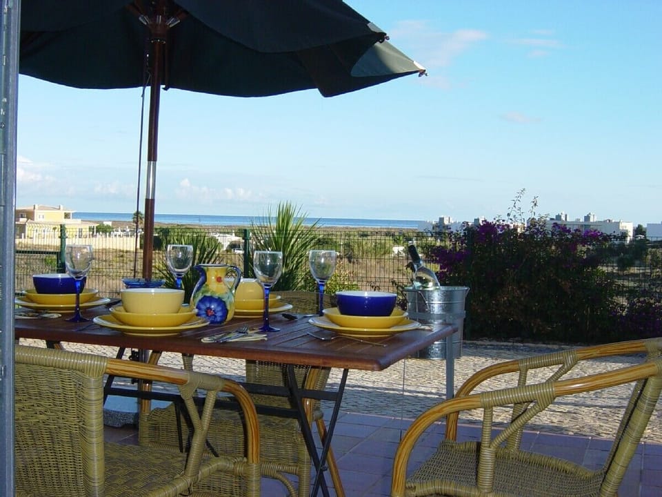 Patio with superb views of Meia Praia Beach