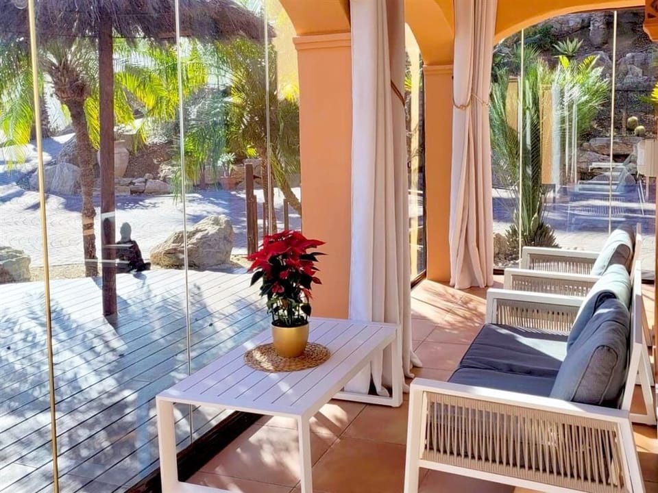 Terrace with sliding doors and plenty of outdoor seating