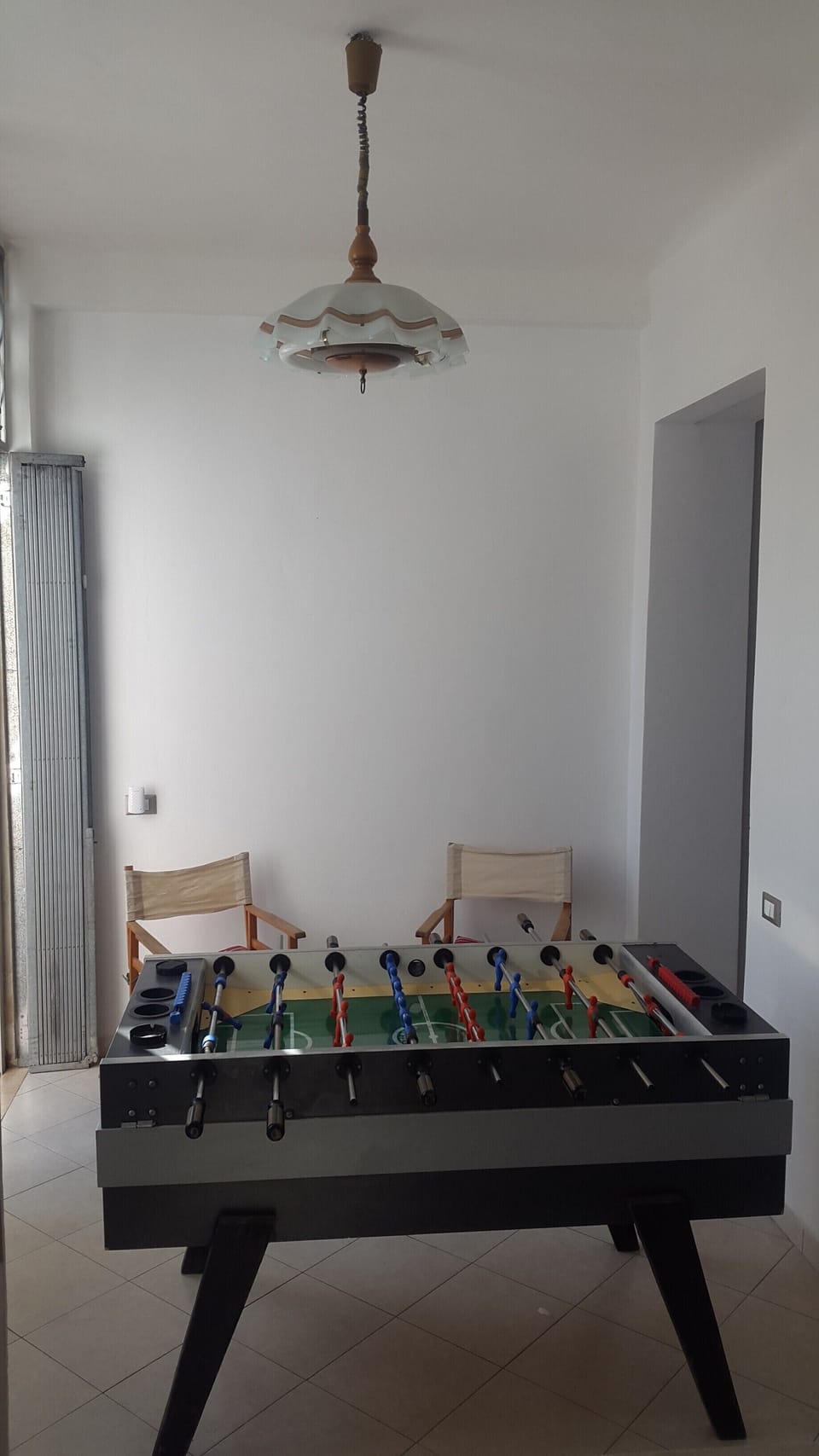 Game room with  football table for fun time among family & friends