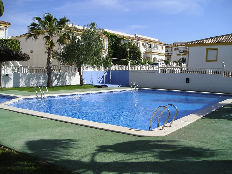 The pool and gardens across from our house
