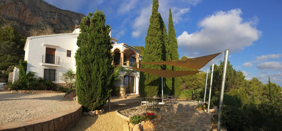 Front of the villa with shadded terrace.