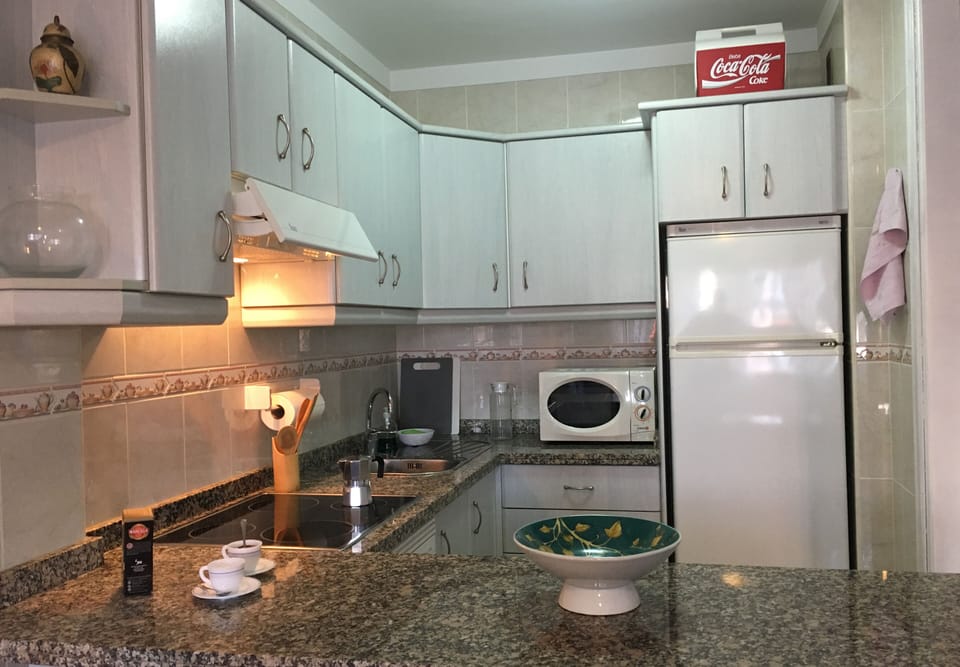 The kitchen is fully equipped. The portable cooler is for the beach.