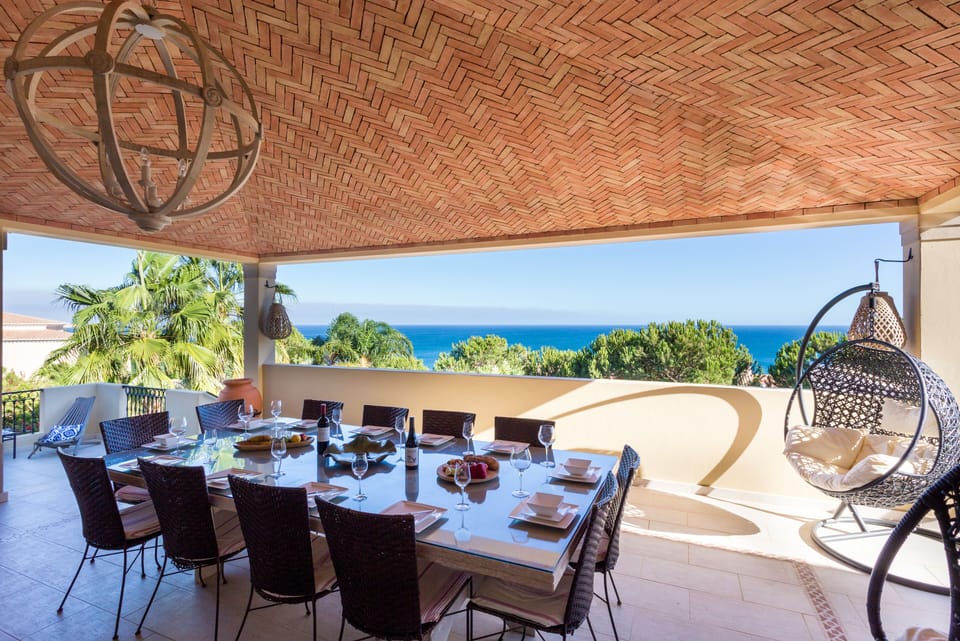 Outside dining area with sea views