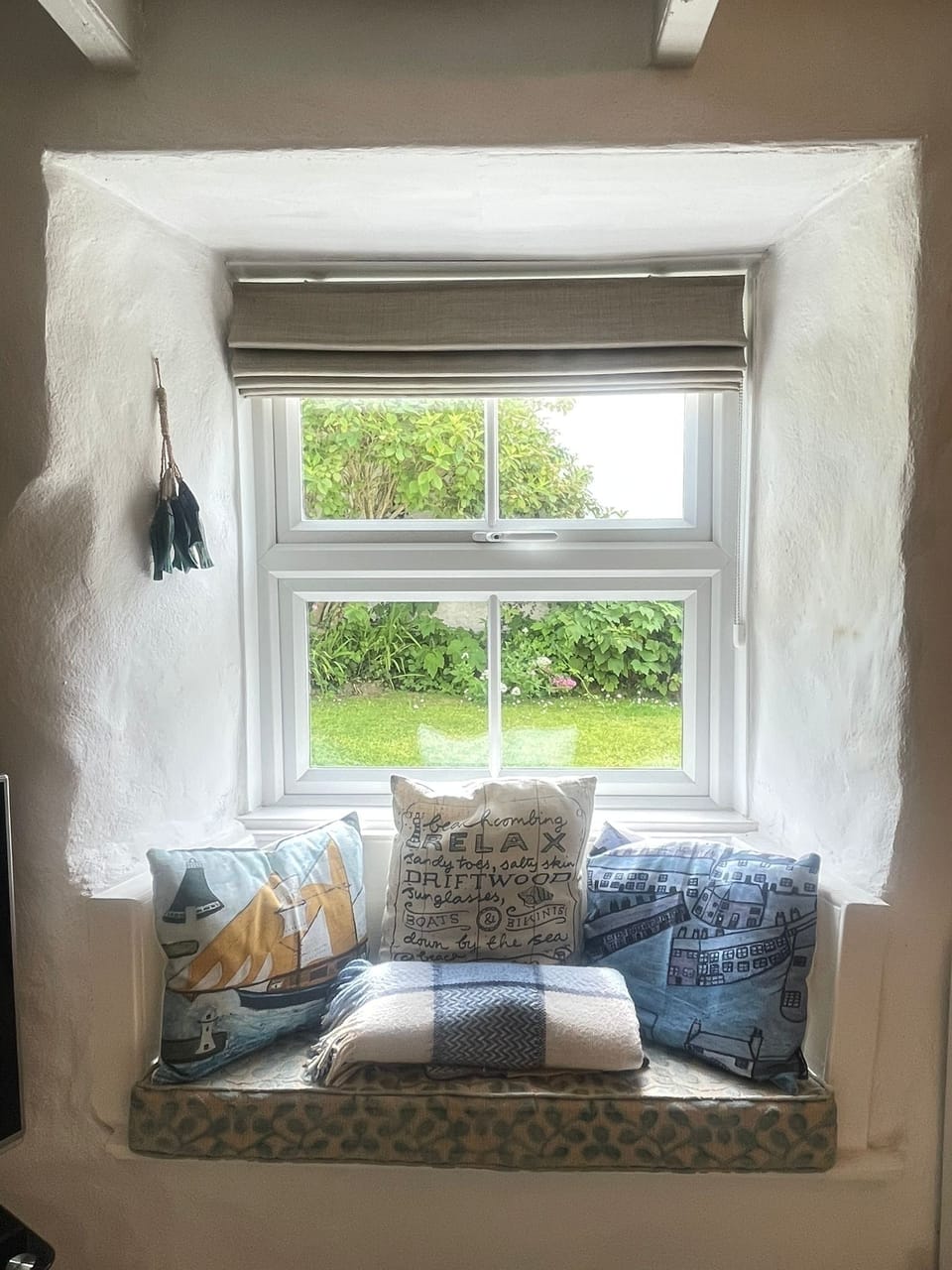The cottage has many original features - window seat in main sitting room