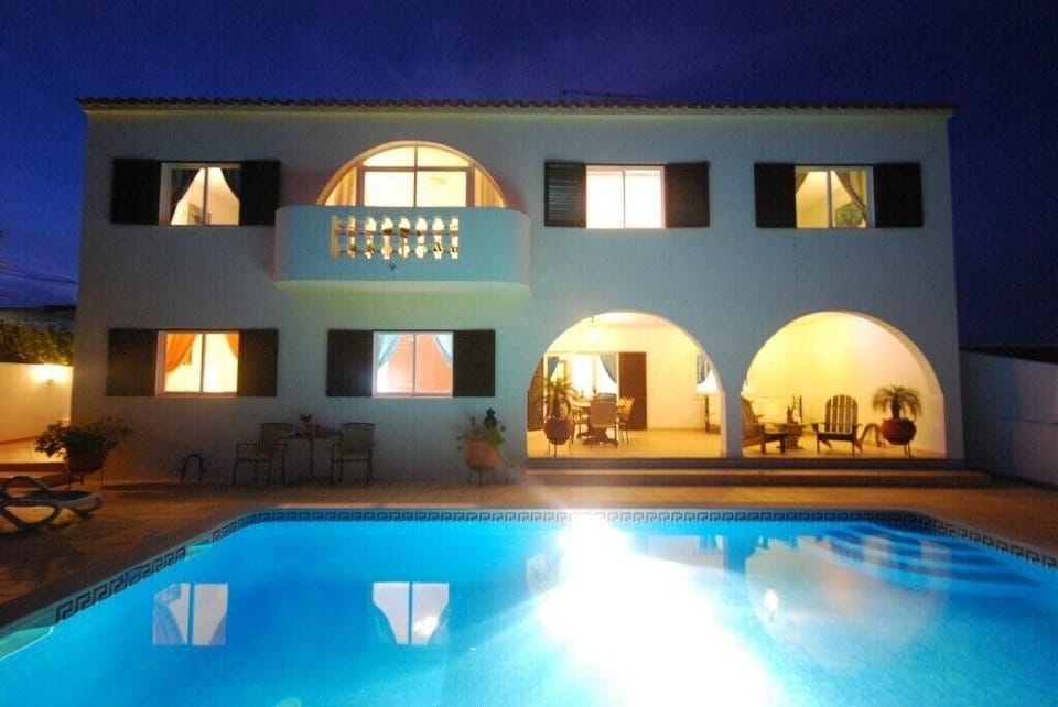 Back of villa at night