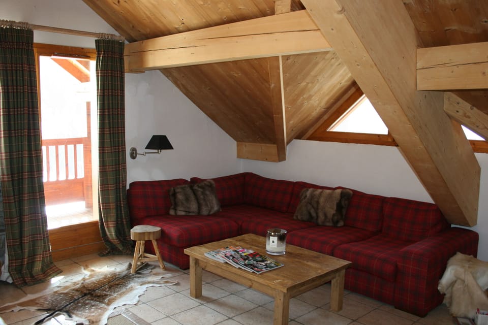 Comfortable seating in the living room.  Right out on to the balcony.