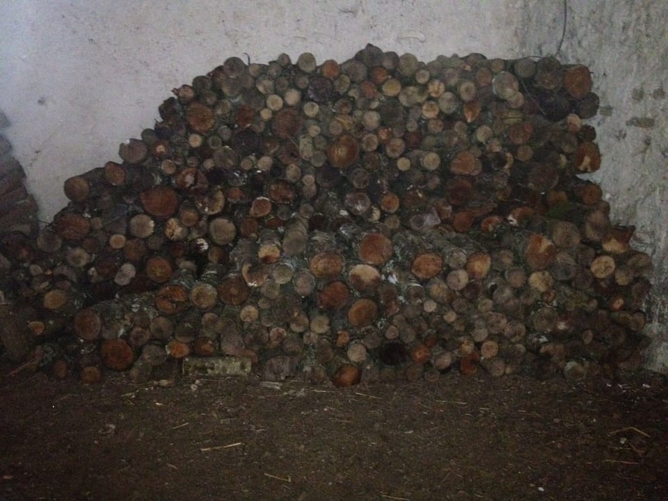 Wood stored in one of our barns.
