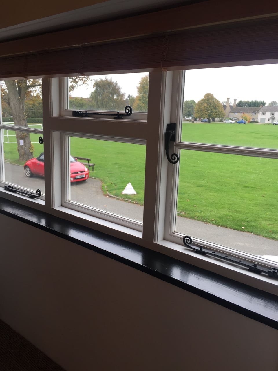 Double bedroom overlooking village green.
