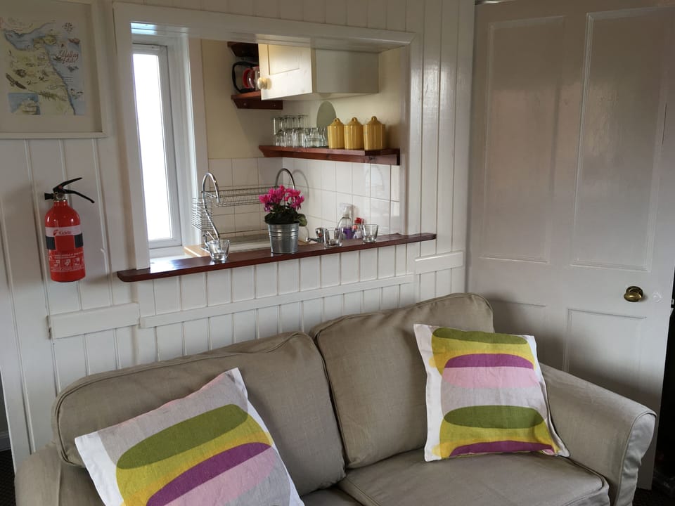 Kitchen area.  Well equipped with induction hob, oven, coffee maker & microwave 