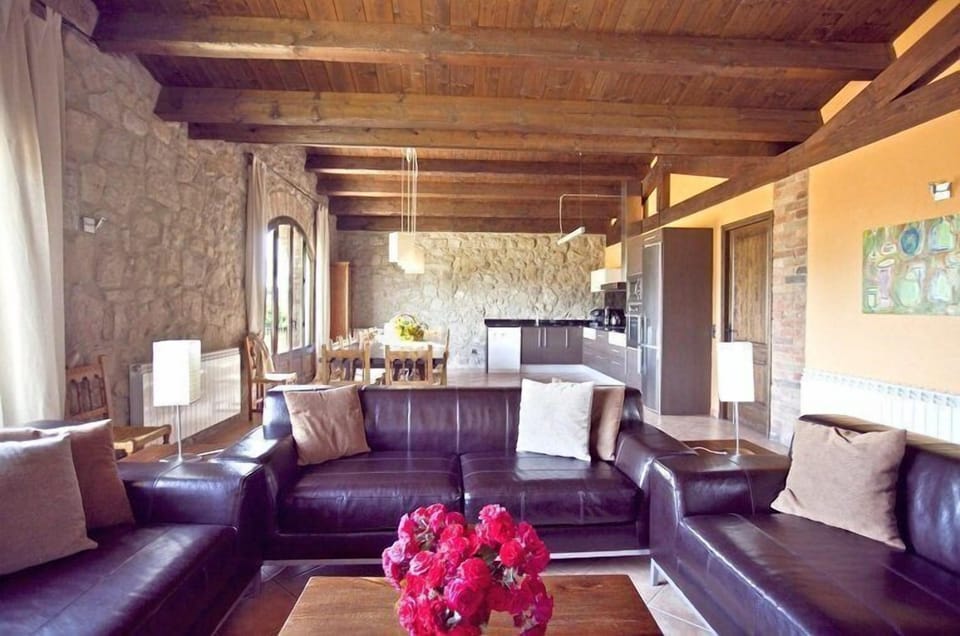 The living room is connected with the dining table and kitchen
