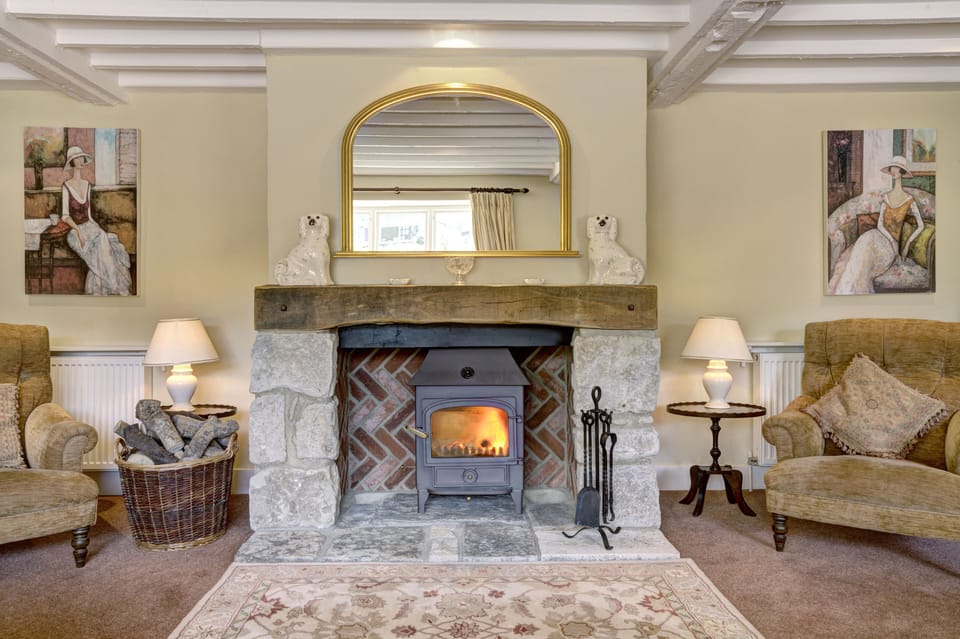 Spacious lounge with woodburner