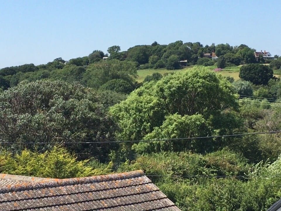 The countryside at the front of the house.