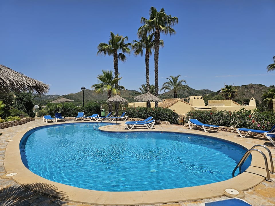 The nearest pool just above rear of property 