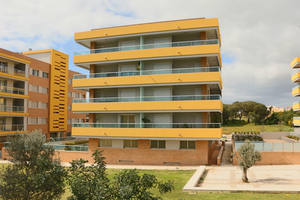 Back view, apartment located top floor right hand side