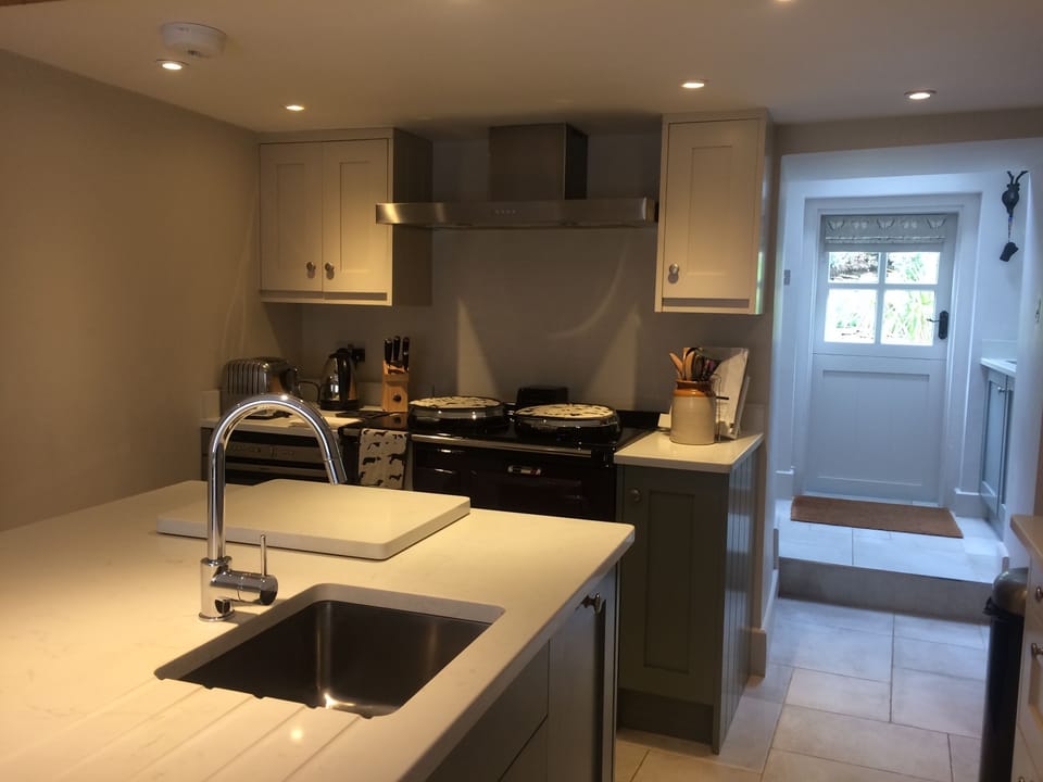 Kitchen includes microwave, convex oven, dishwasher, AGA, fridge, freezer etc.