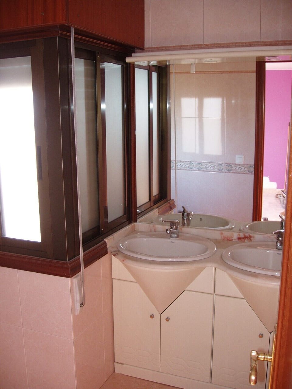 Part view of one of the bathrooms