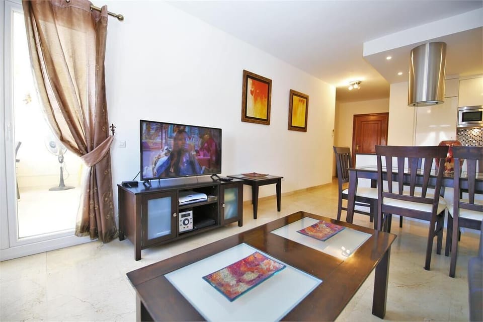 Lounge with comfortable seating, international TV and air conditioning