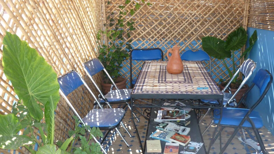 table and chairs on roof terrace