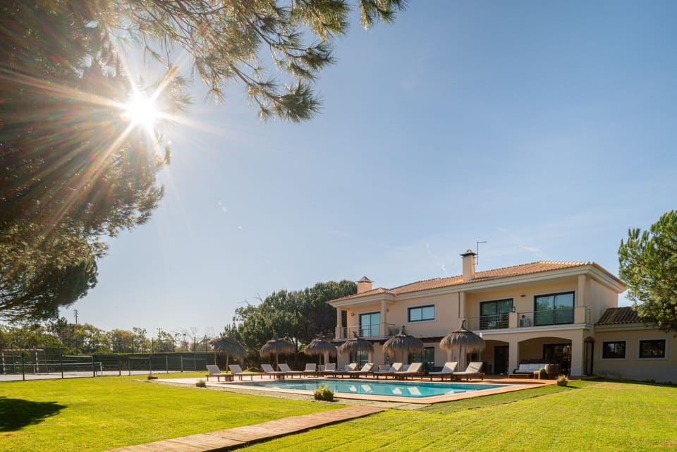 Private pool and sun terrace with loungers — Villa Aqua, luxury holiday villa in Grândola