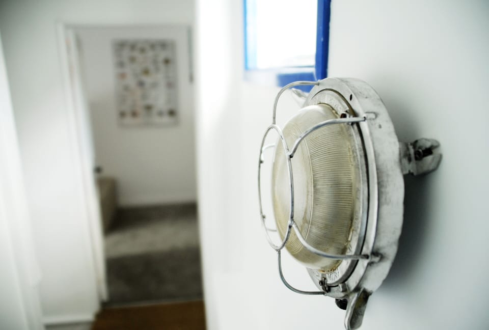 A close-up of one of our vintage marine lights from Any Old Lights