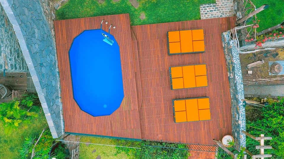 Pool with sunbeds